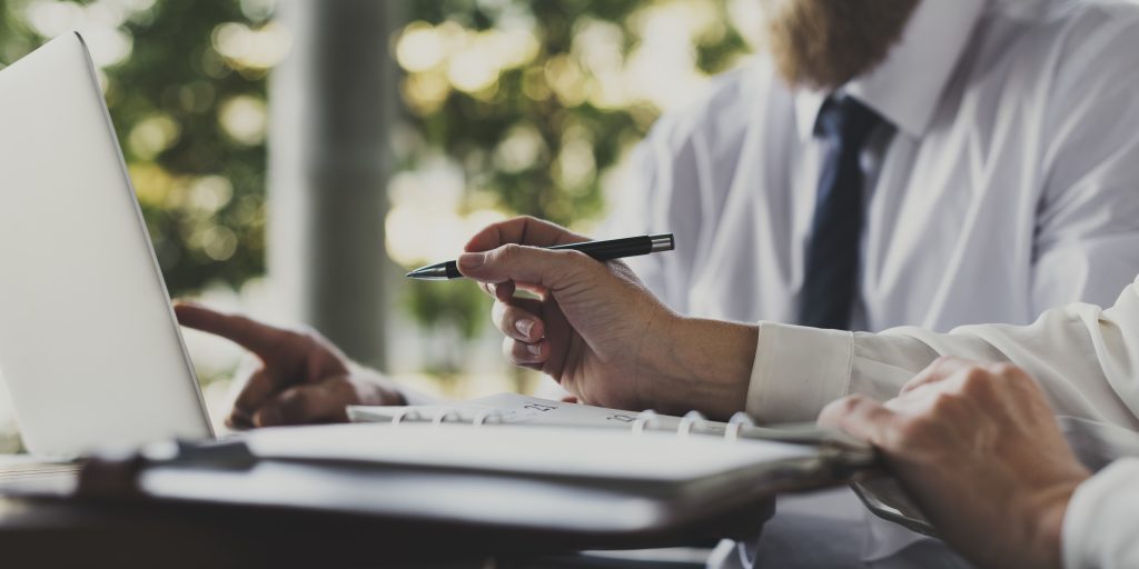 Business professionals managing ISO 27001 compliance with POPIA and GDPR data protection requirements
